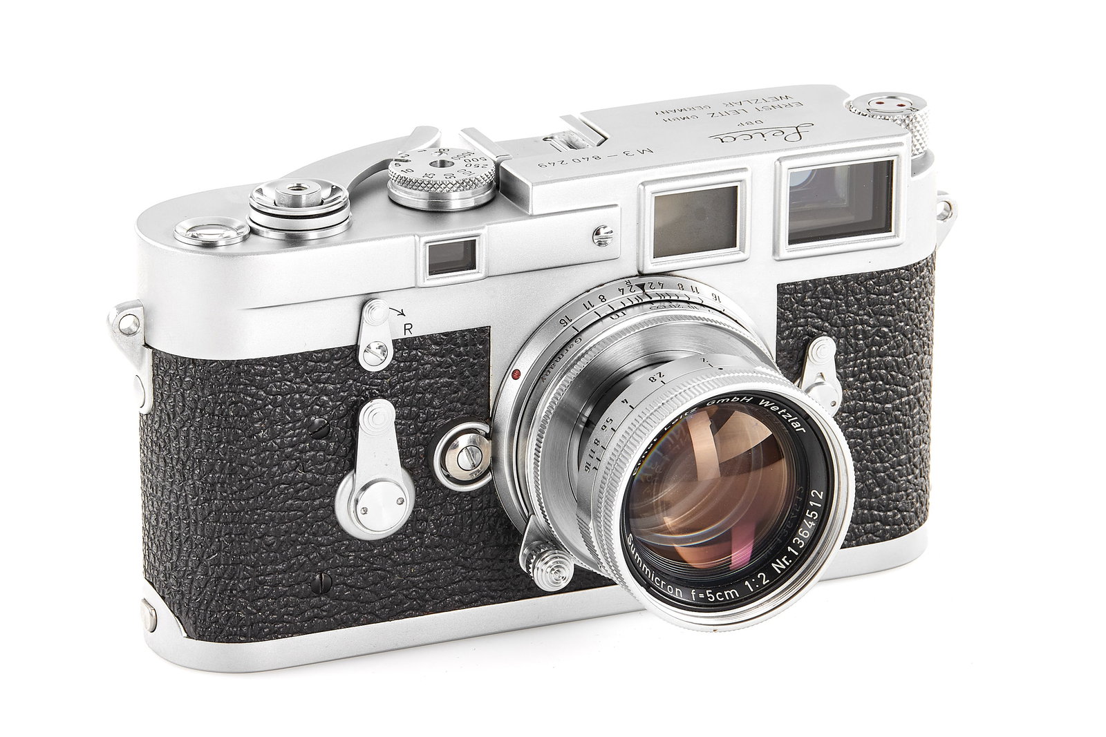 Leica M3 chrome Double Stroke with Summicron 2/5cm *: Double stroke chrome transitional version with some early features such as speed progression with 1/5 sec., glass press film plate, "Buddha ears" strap lugs and late features: frame selector and film 
