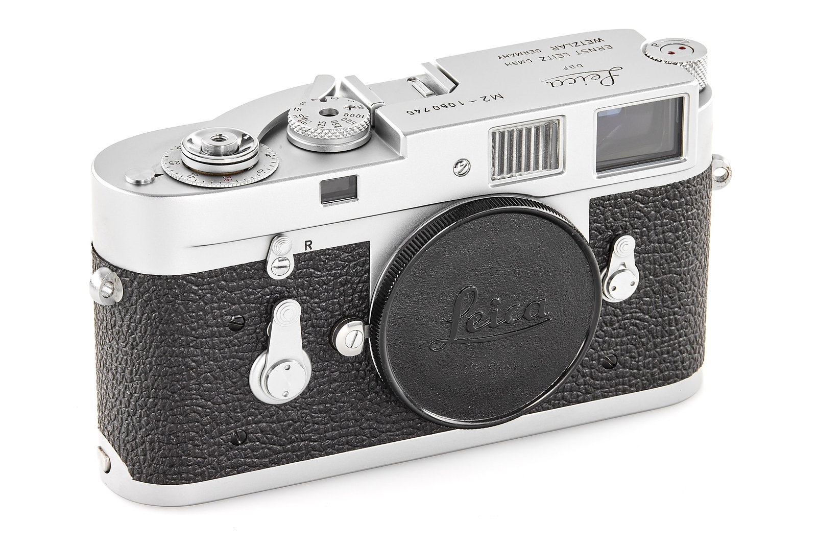 Leica M2 chrome: Beautiful chrome body in mint condition, with self timer, with body cap and maker's box (without serial number), delivered to retailer Petraglio, Biel (Switzerland) on 30.04.1963. SN: 1060745