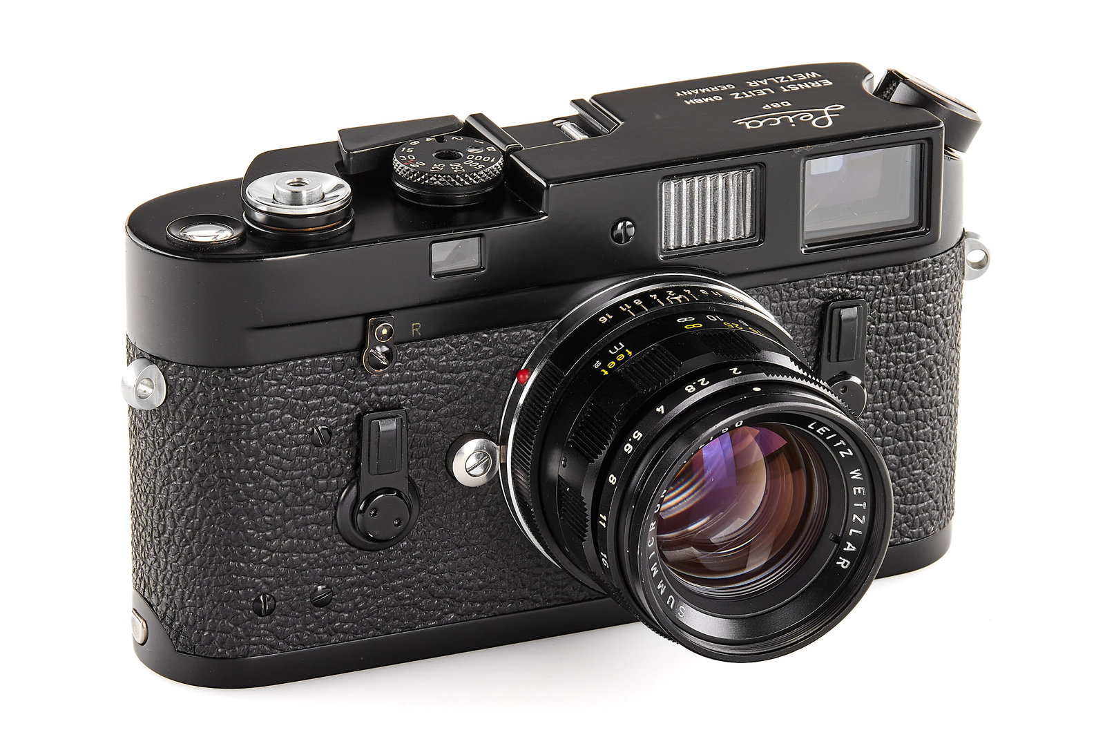 Leica M4 black paint factory sample camera *: Presented here is a Leica M4 black paint factory sample test camera without serial number, fitted with a Transitional Summicron 2/50 mm lens, also without serial number. Camera and lens are in