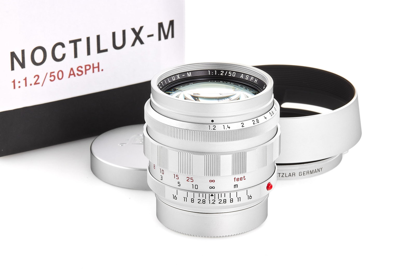 Noctilux 1.2/50mm ASPH. 11702 Edition silver chrome *: The Noctilux 1.2/50mm was one of the first serially produced Leica lenses to feature a black finish. During the transition phase of moving from silver to black-paint lenses, Leica made a very small