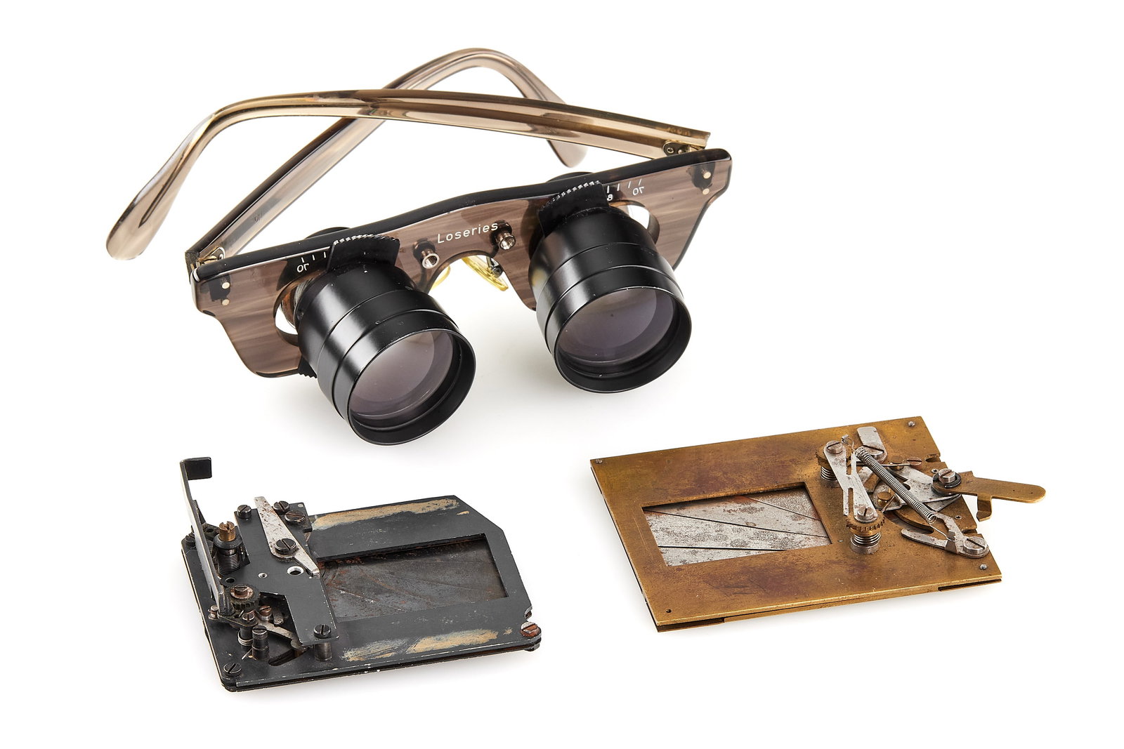 Peter Loseries Shutter Prototypes *: A rare technical lot from the estate of Leica engineer Peter Loseries, comprising two shutter prototype assemblies with metal blades, most likely developed in connection with the Leicaflex system, tog