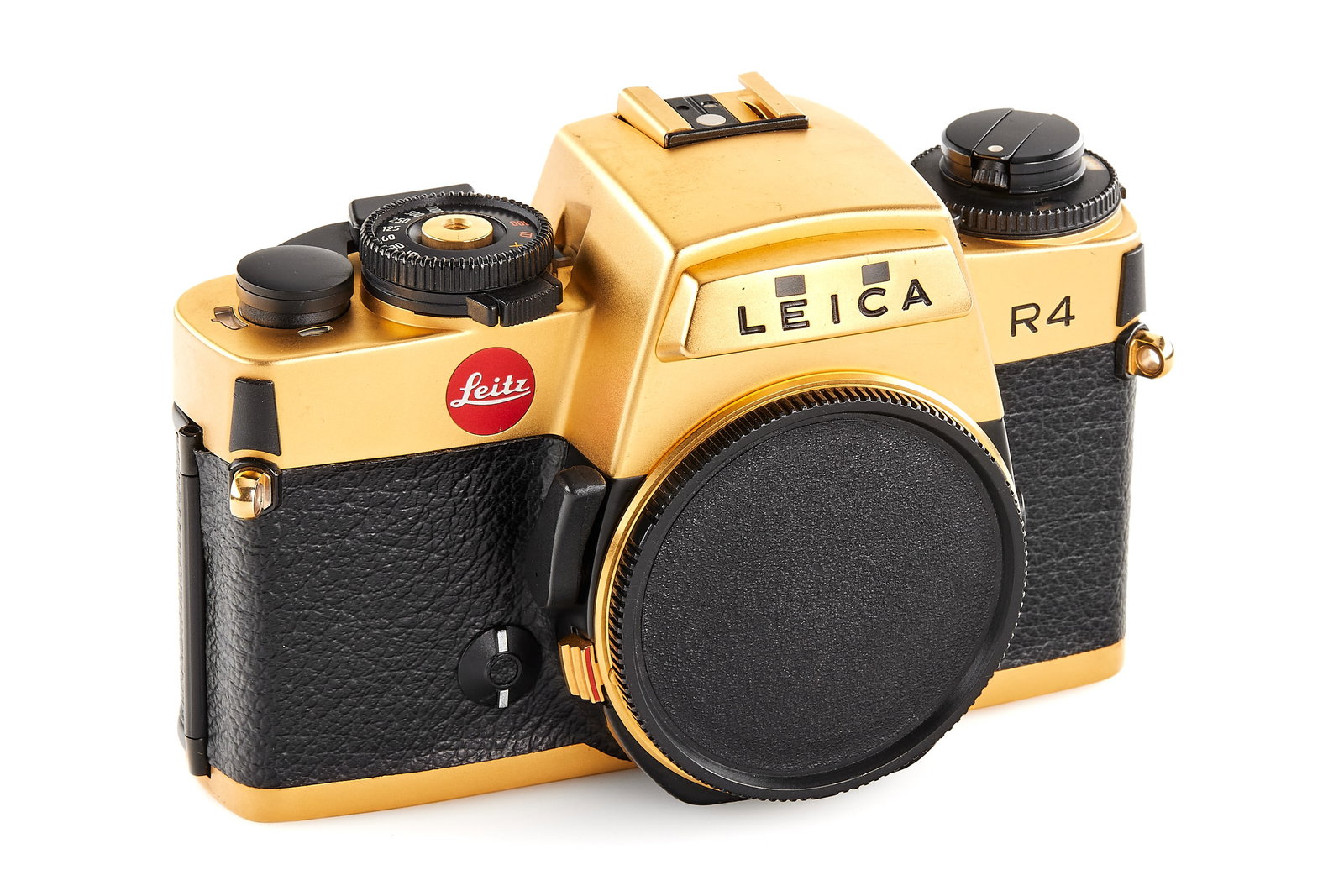 Leica R4 Gold Pre-Series *: Extremely rare pre-series of the limited edition gold plated Leica R4 produced in 1984 in Portugal, in near-mint condition, some scratches on the gold plating, body without serial number or special nu