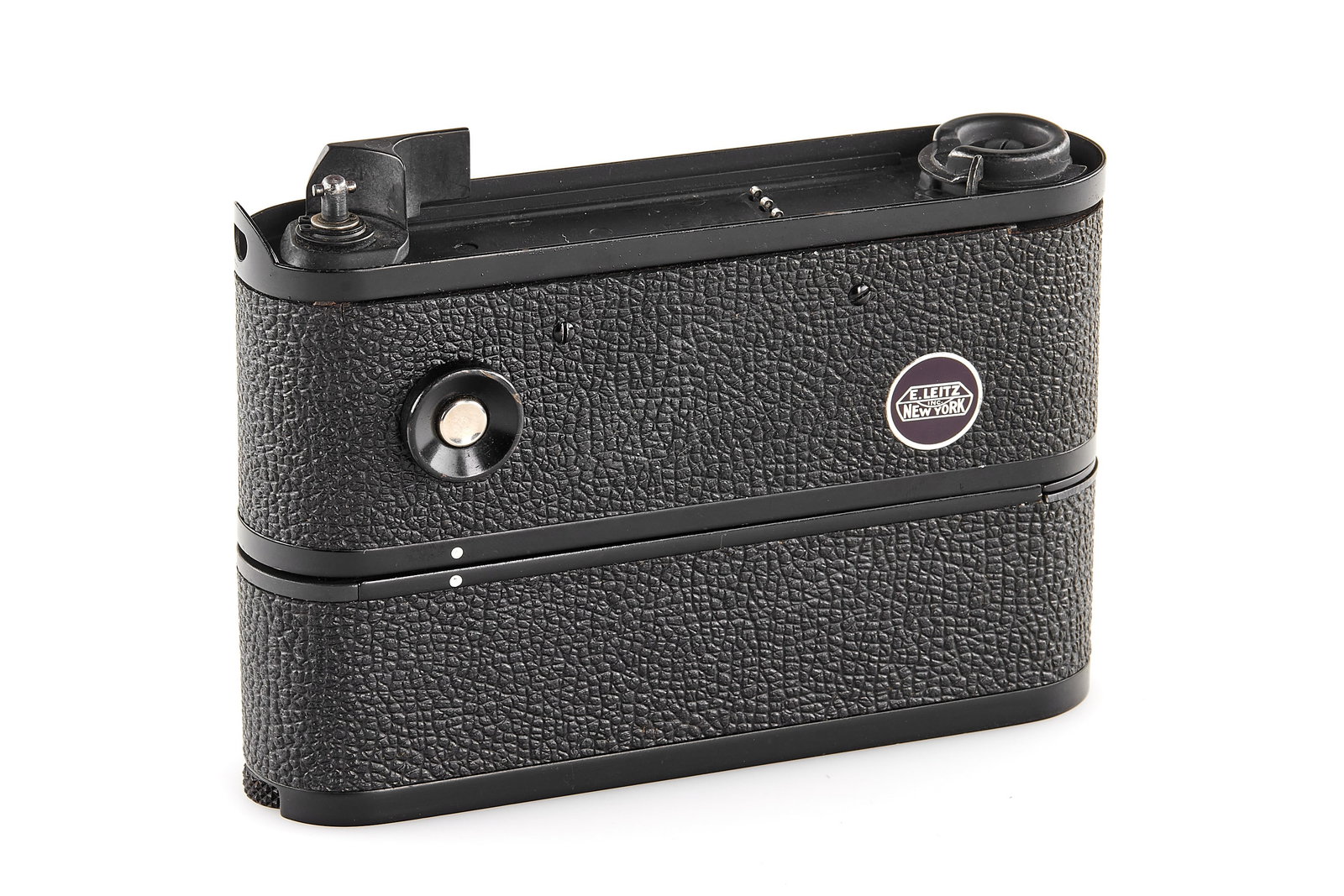 E. Leitz New York Motor Drive: A rare Leitz New York Motor (cat. no. 14100), produced in the late 1960s. Designed for factory-modified M2, MP, M1 and MDa cameras with motor contacts, it provides single or continuous film advance
