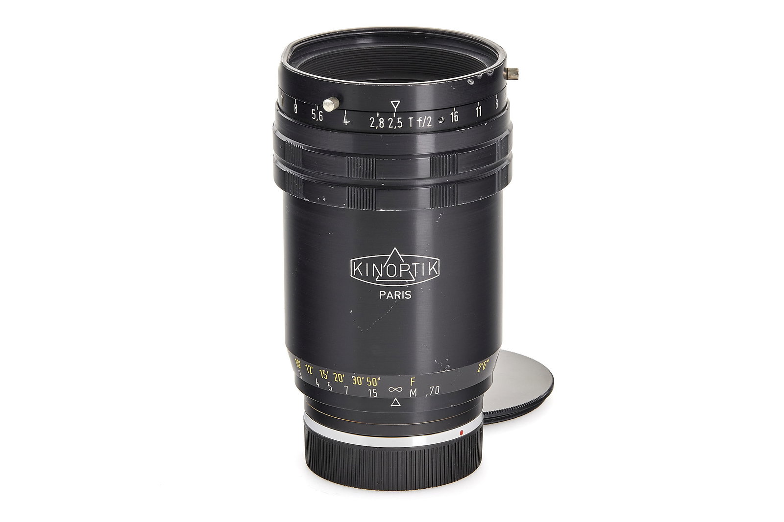 Kinoptik Apochromat f. Leica R 2/75mm: Rare fast macro lens up to ratio 1/1, in original Leica-R mount, in very good condition, good optics with minimal cleaning marks, front filter mount dented, with both caps. SN: 107671
