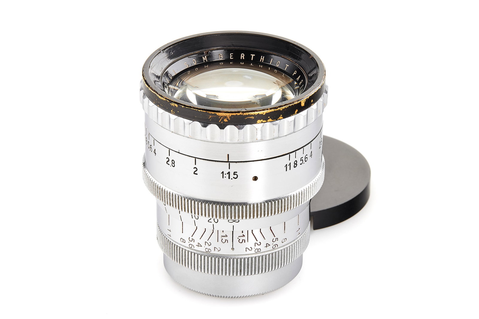 Som Berthiot f. Leica M39 Flor 1.5/50mm: Extremely rare fast lens in Leica M39 mount, RF coupled, heavy brass construction with shiny chrome finish, in very good condition, most probably the first of the batch (we only encountered a similar 