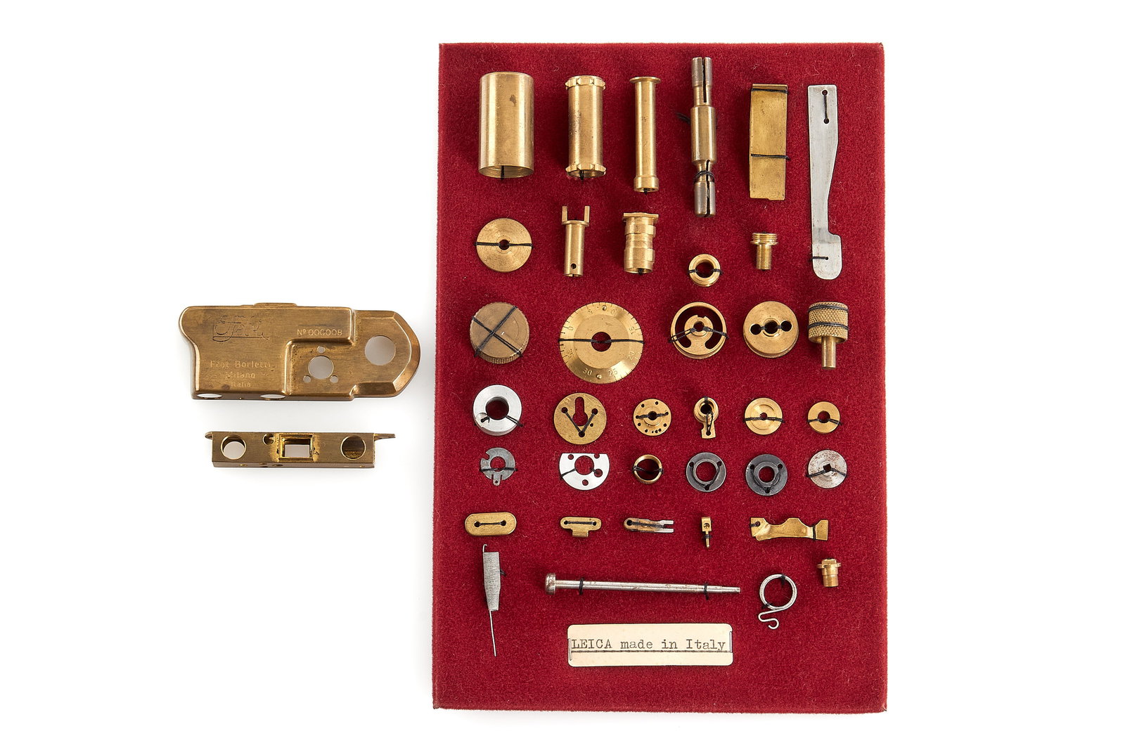 Effebi 'Italian Leica' Parts Exploded *: Extremely rare parts of the 'Italian Leica' Effebi, made by technician Ettore Boscoli, Milan. Just after WWII, he took a Leica IIIa completely appart to study every part in order to produce an improve