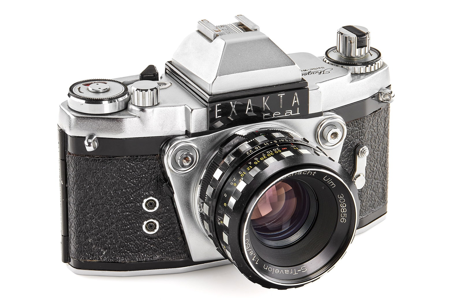Exakta Real chrome: Rare camera here in chrome finish, only a few thousand were put into the market, note the unusual double shutter release, 'Berlin-West' made, in almost mint condition, the shutter needs attention, wit