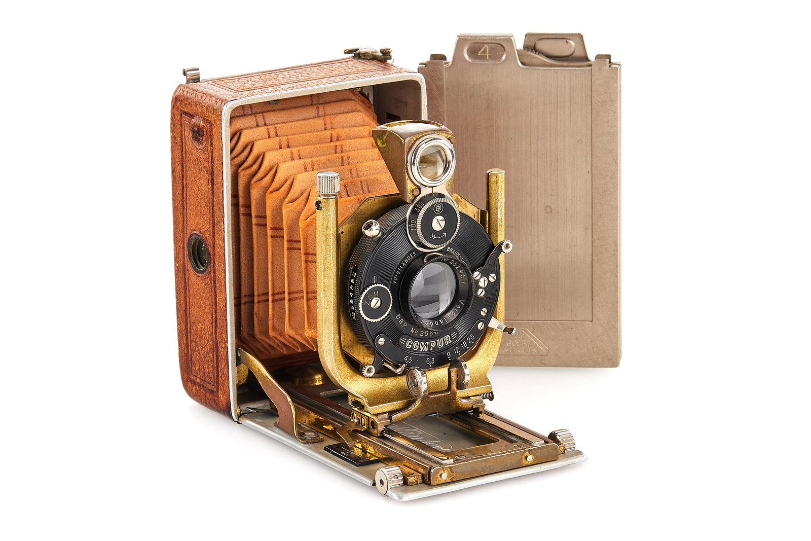 Voigtländer Bergheil Deluxe brown: Rare 4.5x6cm Bergheil with brown leather bellows and covering, gold-colored metal parts, in good condition, the finder is missing, with Heliar 4.5/75mm no.252957 mounted in Compur shutter, with origin