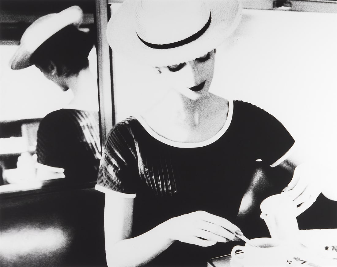 LILLIAN BASSMAN (1917–2012) - Carmen having Tea, c. 1950s: Gelatin silver print, framed 45 x 57 cm (17.7 x 22.4 in) Signed by the photographer in pencil on the reverse; Edition # 5/25 While this print has not been examined out of the frame, it appears to be i