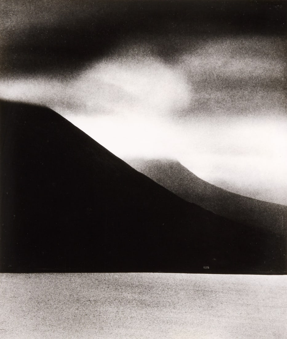 BILL BRANDT (1904–1983) - Skye Mountains, 1947: Gelatin silver print, printed c.1980, mounted on cardboard 34,2 x 29,2 cm (13.5 x 11.5 in) Signed by the photographer in ink on the mount lower right PROVENANCE Private Collection, Texas; acquired fro