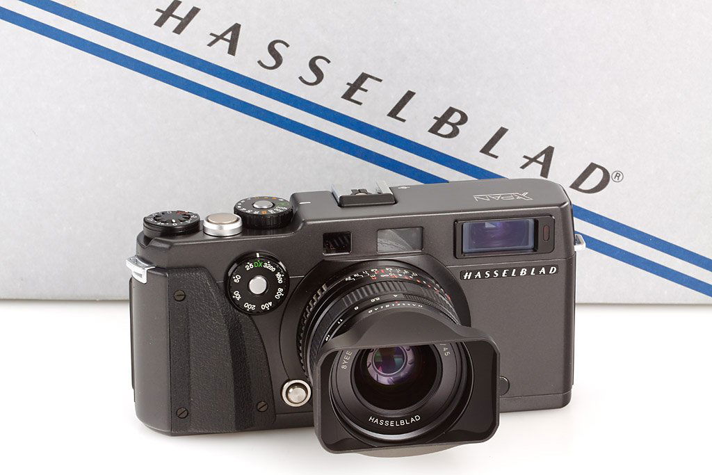 Hasselblad Xpan Set: mint complete set with 4/45mm lens, accessories (hood, caps, strap, papers) with all matching boxes, no. 11EE13874