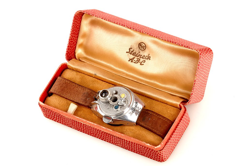 Steineck ABC Watch Camera: near mint wrist watch camera with brown strap and instructions in presentation box, no. 245B