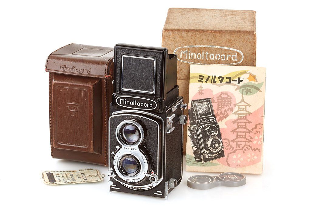 Chiyoko Minoltacord: in mint condition with Promar S III 3.5/75mm no.1107543 in good working Citizen shutter, original cap and everready case, instruction book, owner's card and price card with both matching numbers, comp