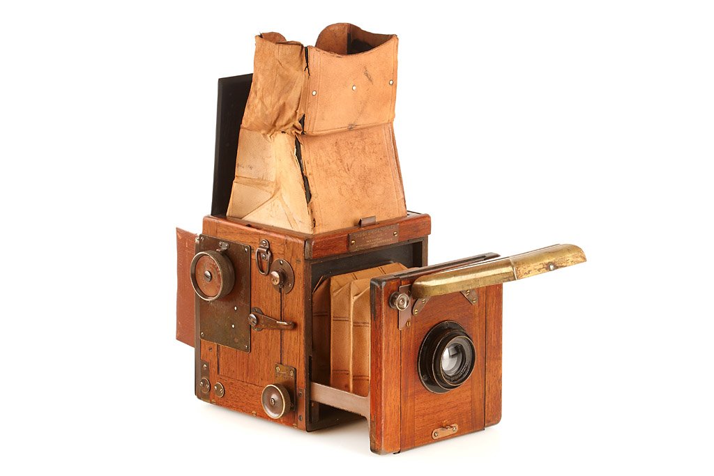 Houghton 'Ensign Special' Reflex -Tropical Model: 6x9cm SLR, rare tropical model, teak body with brass fittings, brown leather bellows, with Dallmeyer Carfac No.2 Ser IV 6/15cm, focal plane shutter (not operable),