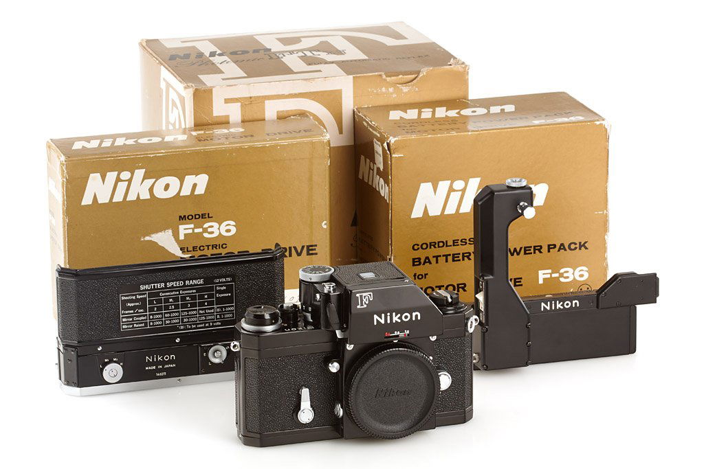 Nikon F Photomic FTN black: late body in near mint condition and good working order with cap, instructions, maker's box, F-36 motor drive type 9 no.148211 with instructions in maker's box, cordless battery pack in maker's box, 1