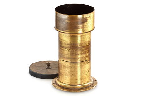 Voigtländer Petzval Lens: very rare large Voigtländer brass lens with approx. 75cm focal length in very fine original condition, lens diameter c.14cm, total height incl. hood 39cm, mounting ring, shutter cap, very hard to fin