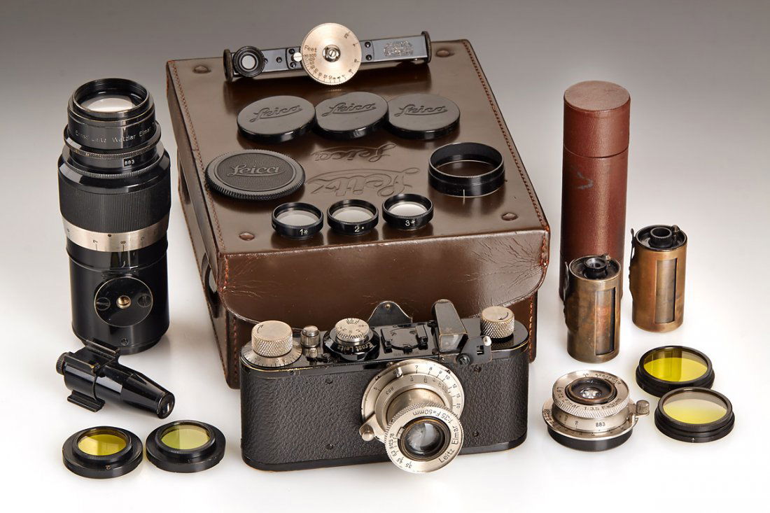 Leica Ic Non Standard Outfit, 1930, no.53883: Very rare and complete Leica model C non standard set in very good original condition, containing body with 13.5 cm swing-in mask and three matching lenses Elmar 3.5 cm f/3.5, 5 cm f/3.5 and 13.5 cm f