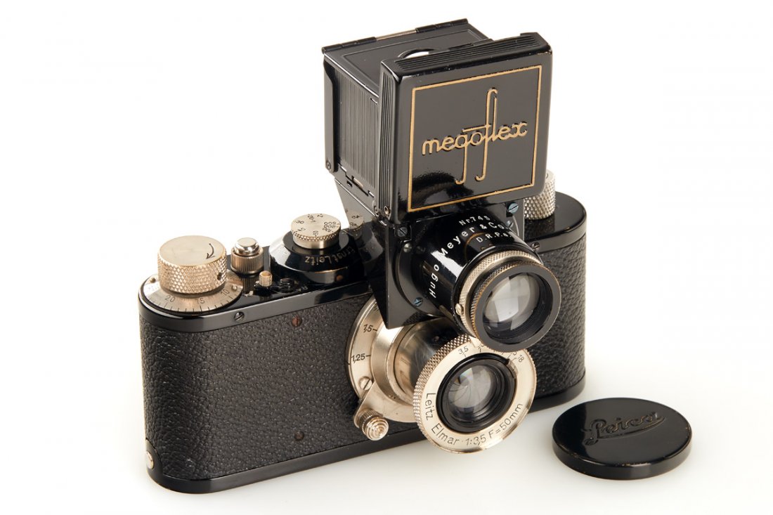 Standard black: in very fine condition and good working order with nickel Elmar 3.5/50mm no.203162 (black painted cap and bakelite body cap), with uncommon Hugo Meyer Megoflex reflex finder no.745 in near mint condit