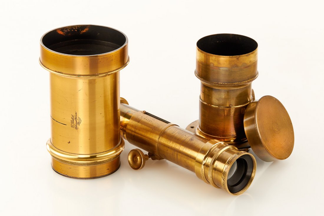 Brass Lenses (Lot): lot of three brass lenses: (1) Berthiot Paris No.7, aplanat lens c.1860, unusual focal length c.80cm, good optics with minimal cleaning marks, total height 18cm; (2) Muller Berlin Petzval lens c.1870,
