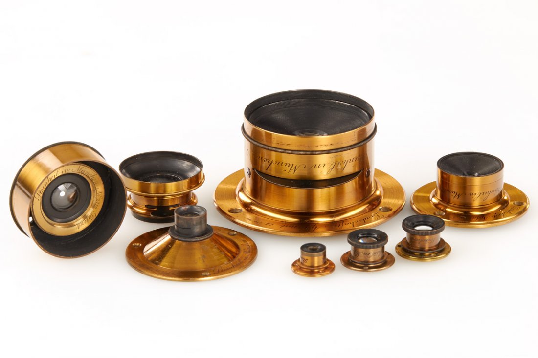 Steinheil Brass Lens Prototyp (Lot) *: A collection of 8 very rare Steinheil lenses, some as small as a fingernail. Listed by serial numbers with detailed information according to Hartmut Thiele's 'Fabrikationsbuch Steinheil Objektive': (1