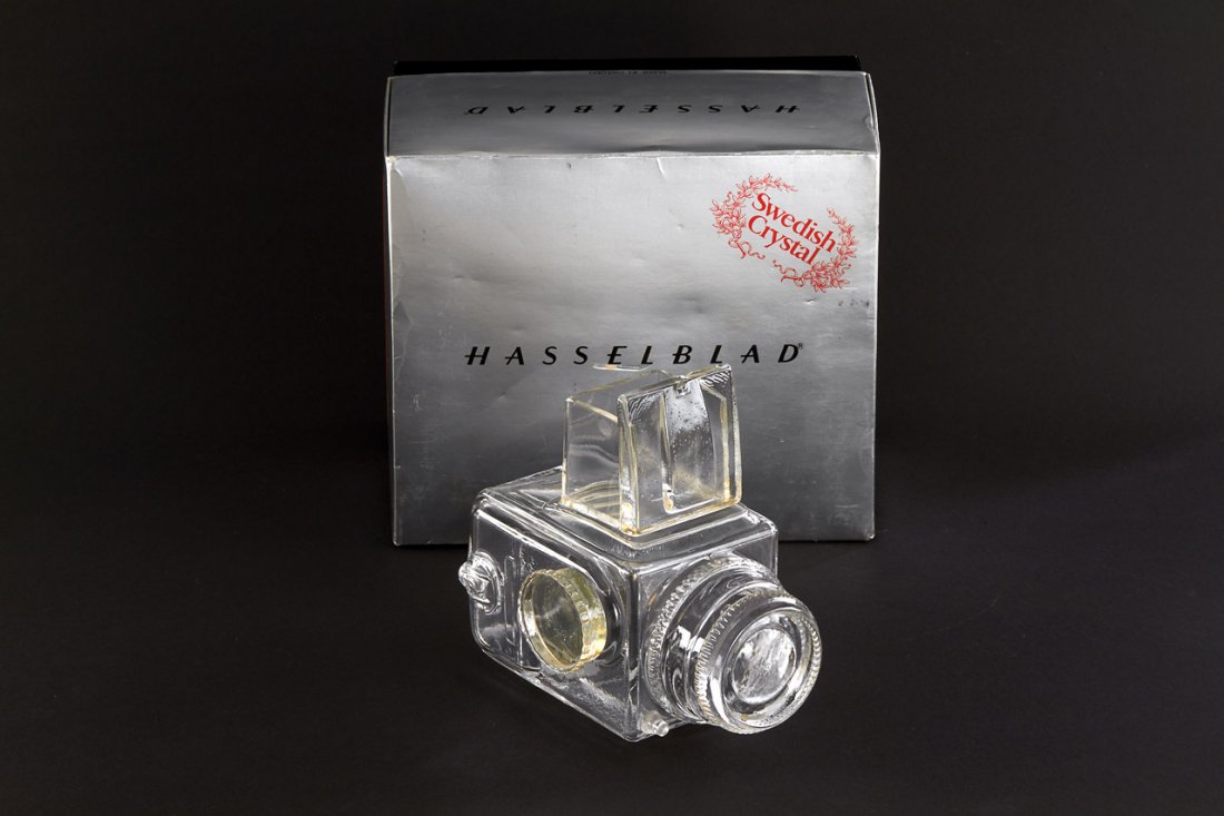 Hasselblad 500C/M Crystal Model: fine glass model of the Hasselblad 500C/M with engraving by designer Christer Sjogren from the Swedish glassblower company Lindshammar, in maker's box, c.1980, no. 2047 The buyers premium for all item