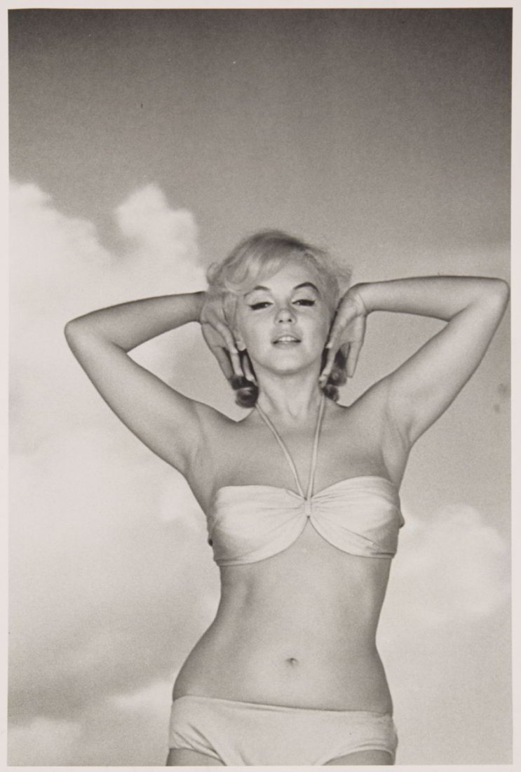 EVE ARNOLD (1912–2012): Marilyn Monroe posing for publicity shots’, Hollywood 1957 RC-print, printed in the 1980s 22 x 14,6 cm Photographer's agency credit and reproduction notes on the reverse, typographic description on