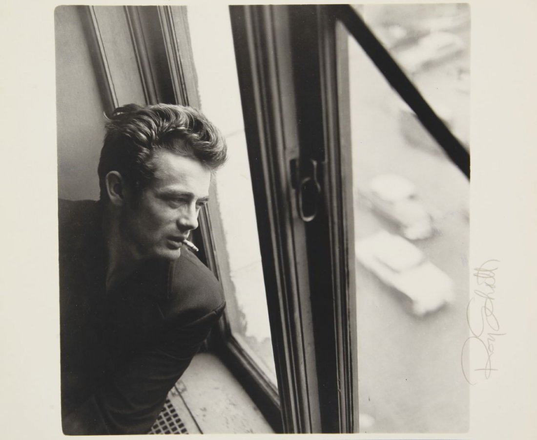 ROY SCHATT (1909–2002): James Dean looking out the window’, New York 1954 Gelatin silver print, printed in the 1970s? 20 x 19 cm Signed by the photographer in pencil in the margin, photographer's studio stamp, his copyrigh