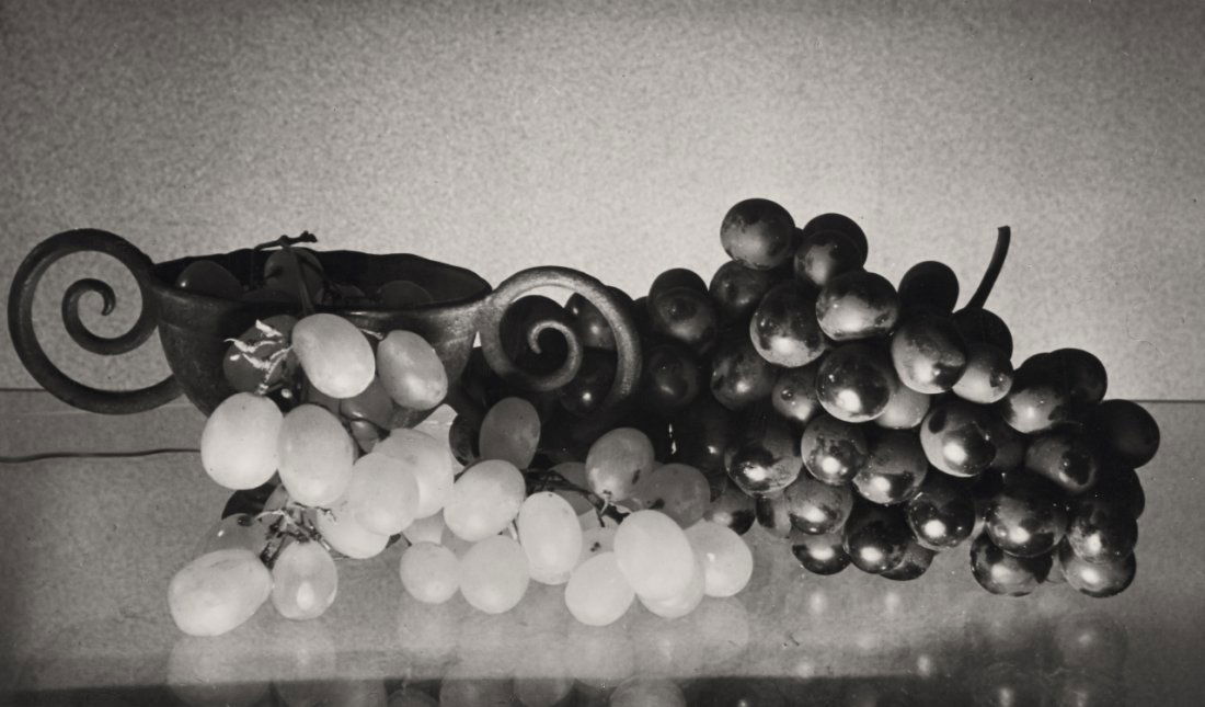 HERBERT LIST (1903–1975) *: Trauben und Schale’ (Grapes and bowl) Hamburg 1933 , Vintage silver print, mounted on original cardboard 10,1 x 17,2 cm Herbert List estate “Vintage Print” stamp on the reverse, therein signed b