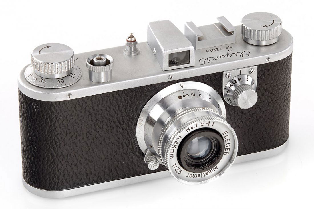 Nitto Seiko Elega-35 *, c.1952, no. 12013: very rare Japanese Leica-styled 35mm viewfinder camera with Eleger Anastigmat 3.5/45mm no.1541, in beautiful condition with original case The buyers premium for all items exported out of E.C. (Europea