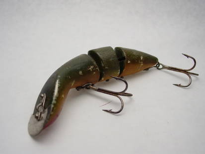 Heddon Gamefisher Lure: Green scale finish. Grade: Fair