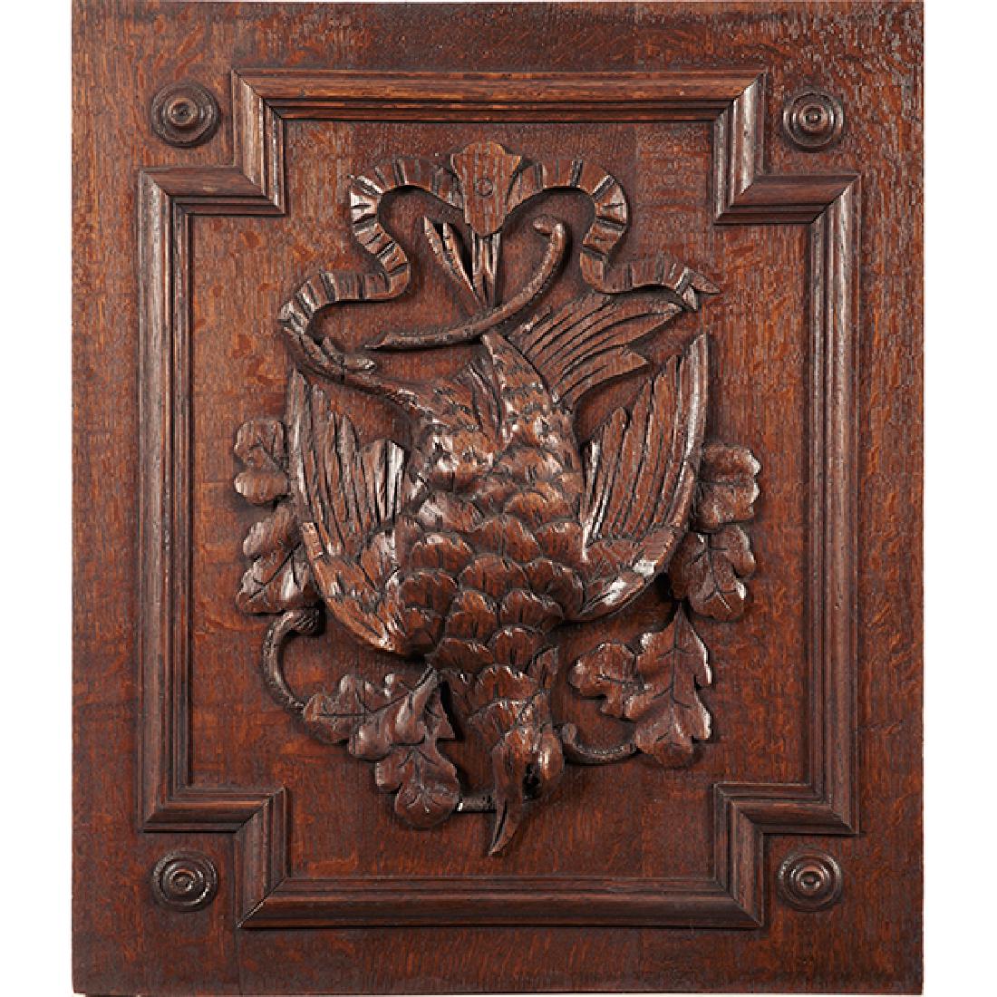 Antique, game themed relief panels depicting fish and a (1 of 2)