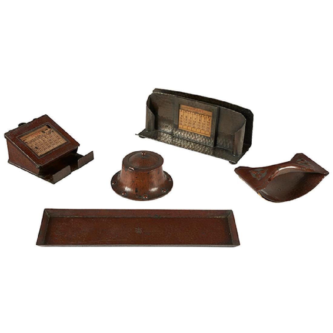 The Roycrofters assembled desk set, five pen tray:: The Roycrofters, assembled desk set, five, East Aurora, NY, hammered copper, four with impressed orb mark, comprising a pen tray, rocker blotter, inkwell and two dual purpose calendar holders, pen tra