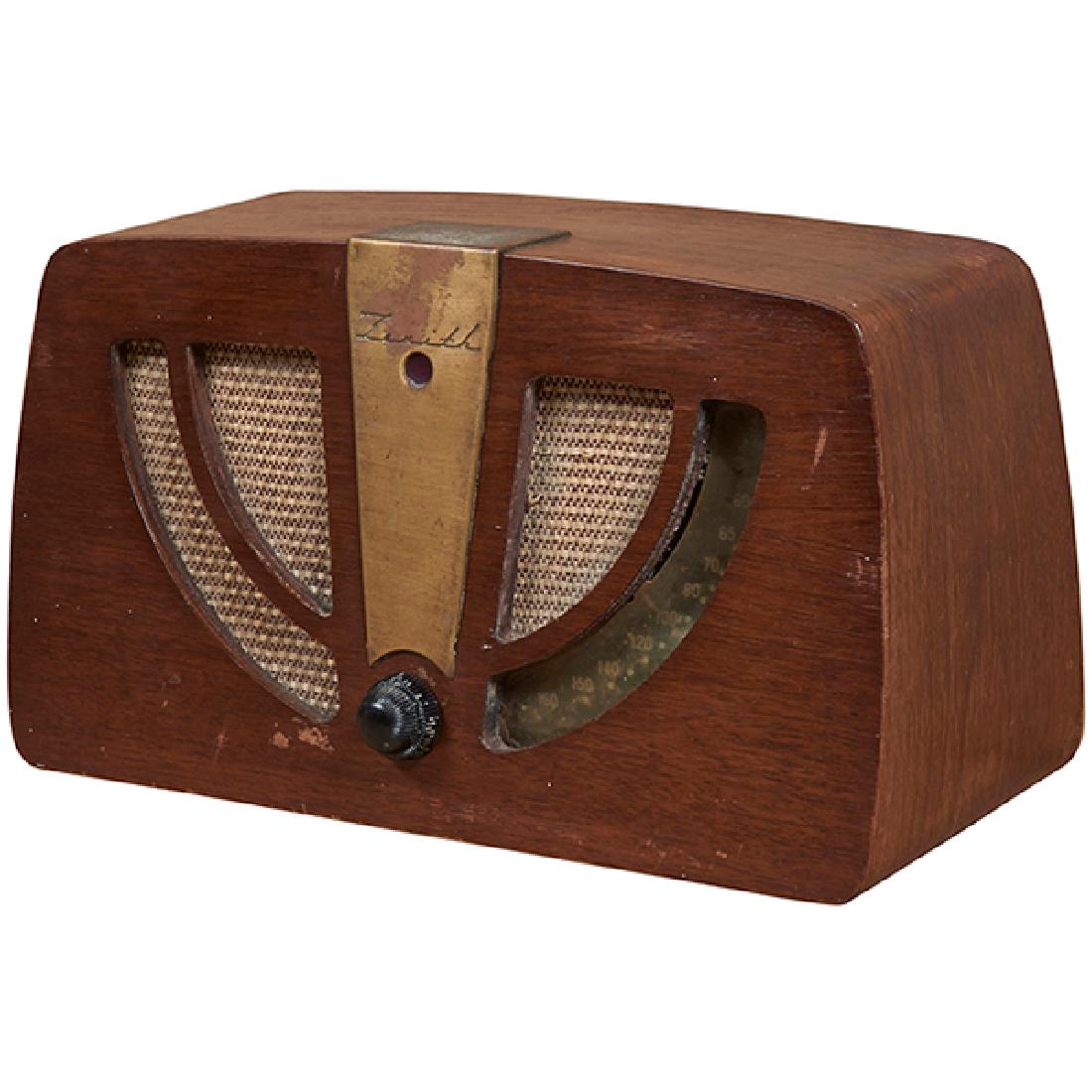 Charles & Ray Eames Evans/Zenith Corp. radio: Charles Eames (1907-1978) & Ray Eames (1912-1988) for Evans Products/Zenith Radio Corp., radio, model 6DO30Z, USA, c.1946, walnut plywood, fabric, brass, Bakelite, stamped marks, 13.5"w x 6"d x 7.75"h