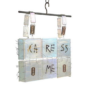 Silvia Levenson (Argentinian/Italian, b. 1957), Caress: Silvia Levenson (Argentinian/Italian, b. 1957), Caress Me hanging sculpture, Italy, 2002, iridescent glass, embedded razor blades, metal wire, 14"w x 2.25"d x 16"h Provenance: Braggiotti Gallery Conte