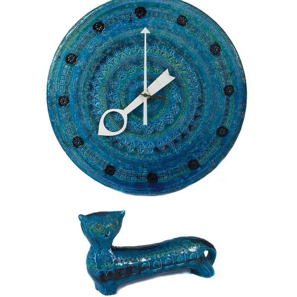 George Nelson Meridian wall clock: George Nelson Meridian wall clock, ceramic, made in Italy by Raymor, green and blue hi-glaze with impressed decoration, white enameled hands, battery operated, paper label, 14.5"dia., with a matching