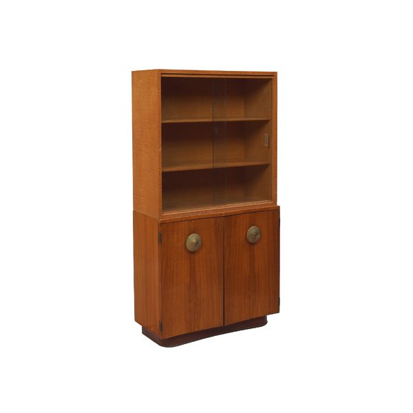 Gilbert Rohde Paldao Group china cabinet: Gilbert Rohde Paldao Group china cabinet, by Herman Miller, c.1940, lower cabinet with two doors with original brass pulls over a leatherette wrapped platform base with studded detail, interior consis