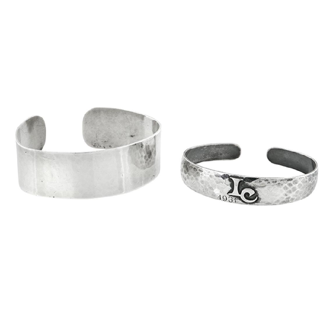 John Pontus Petterson (1884-1949) cuff bracelets, two: John Pontus Petterson (1884-1949), cuff bracelets, two, Chicago, IL, sterling silver, stamped marks, personalized example with applied IC monogram, dated 1931 and inscribed Irene, larger: 2 3/8"w x 1
