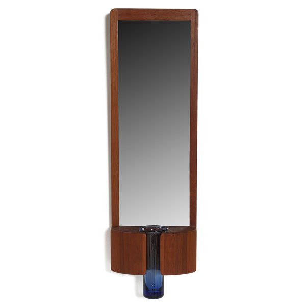 1109: Randers Mobelfabrik wall mirror, with Holmegaard : Randers Mobelfabrik wall mirror, with Holmegaard blue glass vase insert, Denmark, teak frame, stamped mark to back, etched signature to vase, vase is 6.25"h, mirror is 7.75"w x 23.75"h, excellent cond