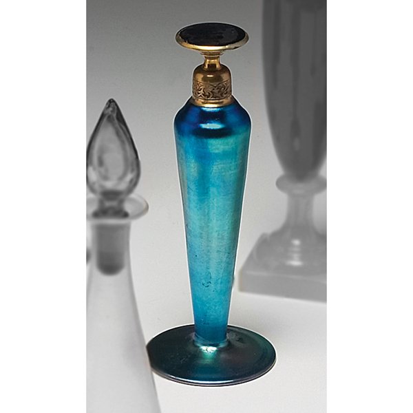 Steuben perfume bottle blue aurene: Steuben perfume bottle, blue aurene with brass stopper, signed De Vilbiss, shape #6136, 6"h Condition Report: no problems; painted De Vilbiss, in gold, on base; overall very good condition