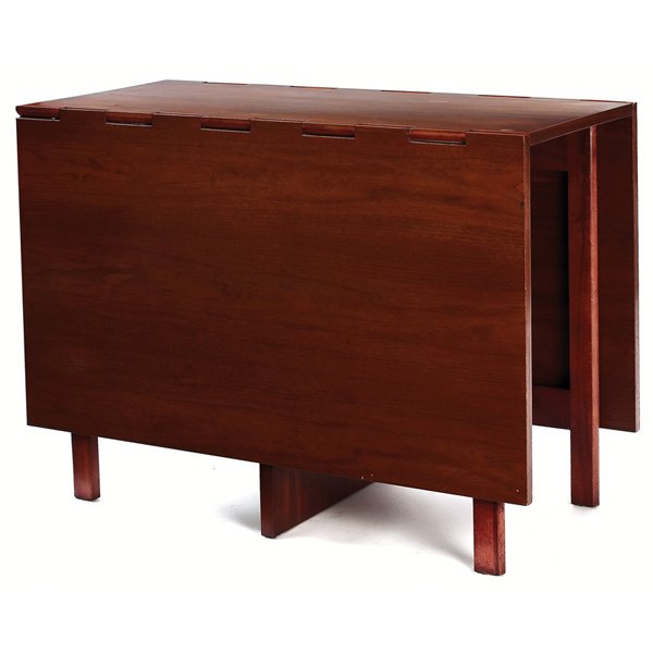 George Nelson Gateleg dining table: George Nelson Gateleg dining table, by Herman Miller, no. 4656, c. 1950, walnut, drop sides with dovetail construction and swing-out legs to support extended top, original finish, closed: 40"w x 18.5"