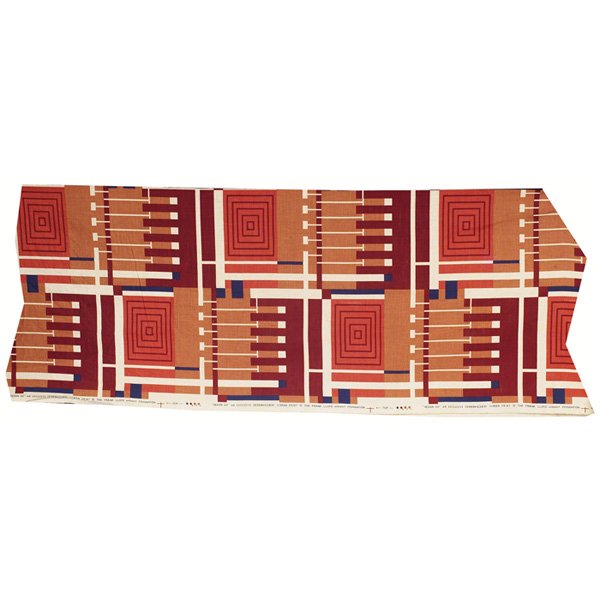 Frank Lloyd Wright fabric: Frank Lloyd Wright fabric, Schumacher line, design #102, geometric Prairie design in red, tan and blue, border signed with "An Exclusive Schumacher Screenprint © The Frank Lloyd Wright Foundation," 5