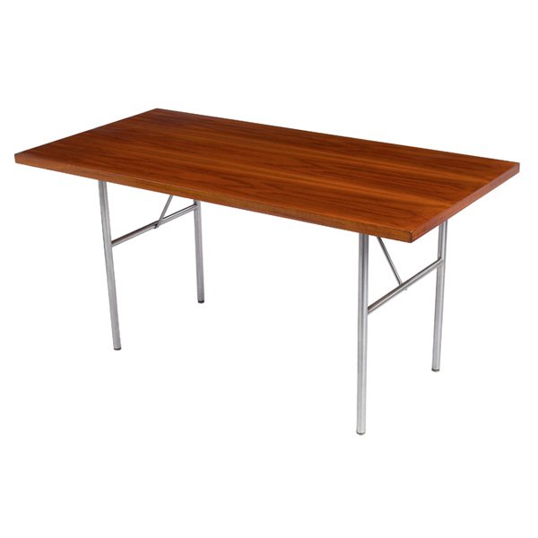 George Nelson dining or work table: George Nelson dining or work table, by Herman Miller, rectangular walnut top over brushed steel legs with angled struts, original finish, signed with round Herman Miller tag, 59"w x 29.5"d x 29.5"h, e