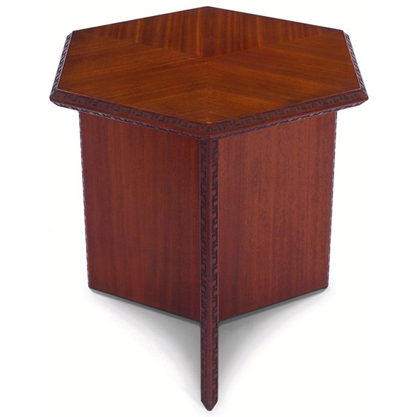 Frank Lloyd Wright table: Frank Lloyd Wright table, manufactured by Heritage Henredon, tall form with hexagonal top and Taliesin design to edges, signed with red monogram, original finish, 25"w x 29"d x 27"h, very good conditi