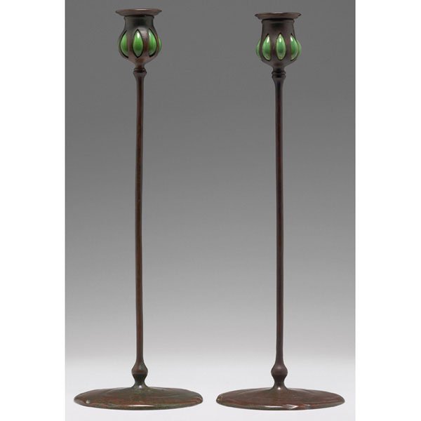 Tiffany Studios candlesticks, bronze favrile glass