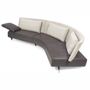 Niels Bendtsen "Baku" sofa, by Montis: Niels Bendtsen "Baku" sofa, by Montis, three-piece modular sectional with feet that link together via aluminum clips and curved, asymmetrical backrests, three loose tan backrest cushions, one leather