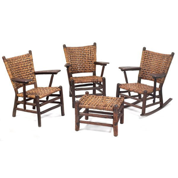 Old Hickory style seating group, two armchairs, on: Old Hickory style seating group, two armchairs, one rocker, and a footstool, in woven splint, some breaks throughout, armchairs: 27"w x 28"d x 35"h, rocker: 26"w x 34"d x 34"h, footstool: 22"w x 18"d