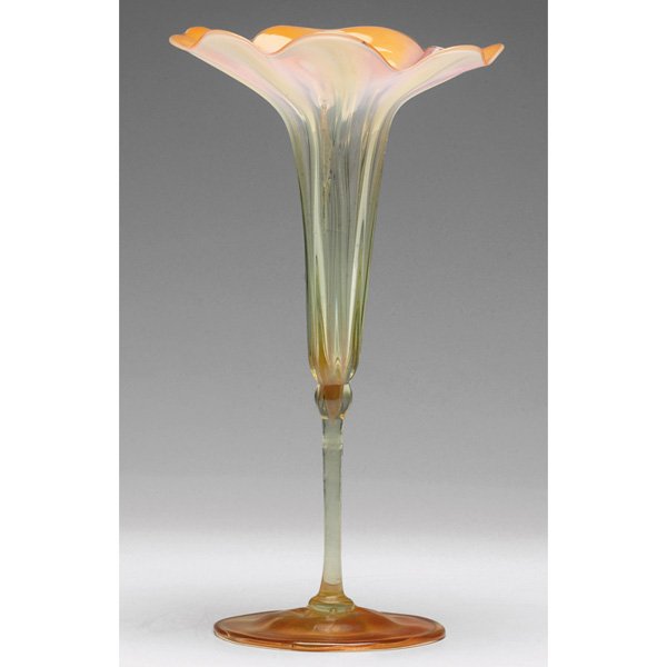 Rare L.C. Tiffany vase, gold favrile glass: Rare L.C. Tiffany vase, floriform in gold favrile glass with peach-colored accents at top, signed L.C.T., #M1142, 5"w x 9.75"h, unusual shape and unusual glass