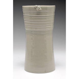 William Wyman vase, ribbed shape: William Wyman vase, ribbed shape with applied accent to rim, covered in gray glaze, signed, 1970, 4.25"w x 8.5"h