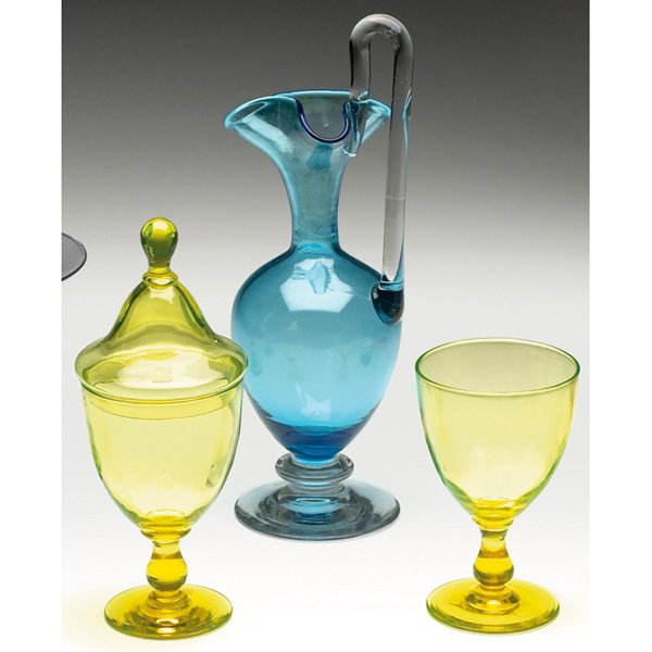 Pairpoint covered vessels, lot of three: Pairpoint covered vessel, tapered form in yellow glass, 10"h; with a Pairpoint handled vessel, waisted form in blue glass with clear extending handle, 14"h; with a Pairpoint vessel, tapered form in ye