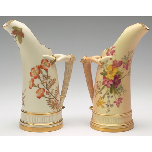 Royal Worcester handled vessels, lot of two: Royal Worcester handled vessel, cylindrical form with elongated spout, decorated with enameled wild flowers and stem handle, marked, 3.5"w x 9"h; with a Royal Worcester handled vessel, cylindrical for